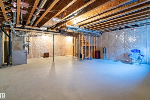 3520 49 Avenue, Beaumont, AB - Indoor Photo Showing Basement