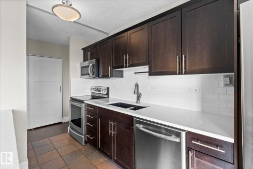 1203 10150 117 Street, Edmonton, AB - Indoor Photo Showing Kitchen With Double Sink With Upgraded Kitchen