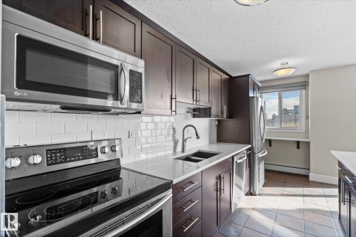 1203 10150 117 Street, Edmonton, AB - Indoor Photo Showing Kitchen With Double Sink With Upgraded Kitchen