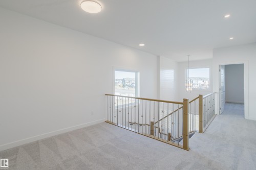 132 Mitchell Bend, Leduc, AB - Indoor Photo Showing Other Room