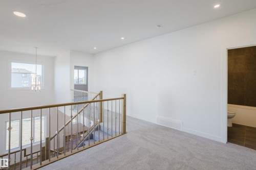 132 Mitchell Bend, Leduc, AB - Indoor Photo Showing Other Room