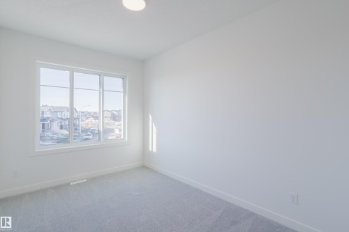 132 Mitchell Bend, Leduc, AB - Indoor Photo Showing Other Room