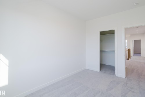132 Mitchell Bend, Leduc, AB - Indoor Photo Showing Other Room
