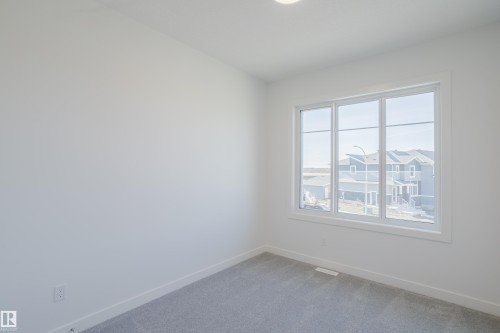 132 Mitchell Bend, Leduc, AB - Indoor Photo Showing Other Room