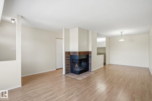 66 2204 118 Street, Edmonton, AB - Indoor Photo Showing Living Room With Fireplace