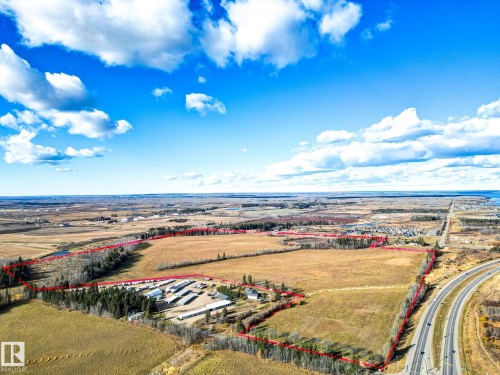 Aerial overview of property's location featuring property parcel outlined - Highway  55 8 Avenue, Cold Lake, AB 