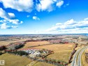 Aerial overview of property's location featuring property parcel outlined - Highway  55 8 Avenue, Cold Lake, AB 