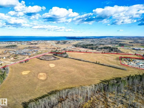 Aerial view of property's location with property parcel outlined and a large body of water - Highway  55 8 Avenue, Cold Lake, AB 