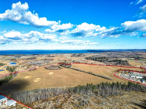 Aerial overview of property's location with property boundaries highlighted and a nearby body of water - Highway  55 8 Avenue, Cold Lake, AB 