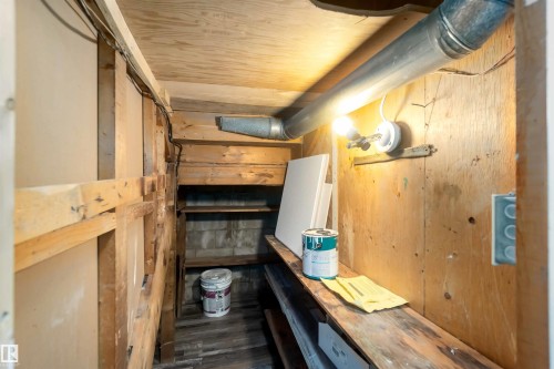 5039 49 Street, Gibbons, AB - Indoor Photo Showing Other Room With Fireplace