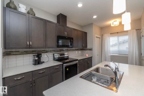 17147 49 Street, Edmonton, AB - Indoor Photo Showing Kitchen With Double Sink With Upgraded Kitchen