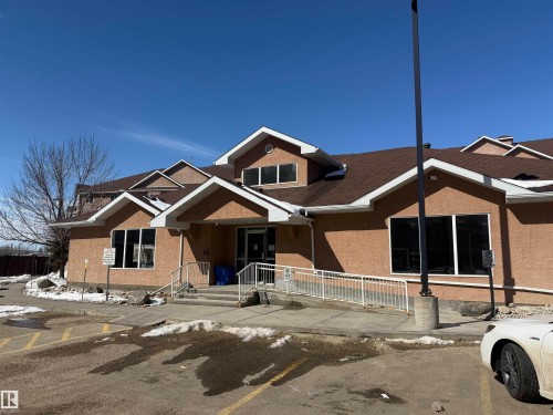 View of front facade with stucco siding - 411 4316 139 Avenue, Edmonton, AB - Outdoor