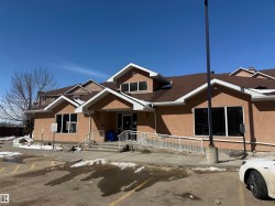View of front facade with stucco siding - 