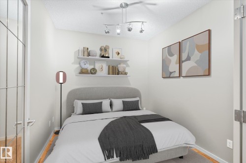 303 9910 111 Street, Edmonton, AB - Indoor Photo Showing Bedroom