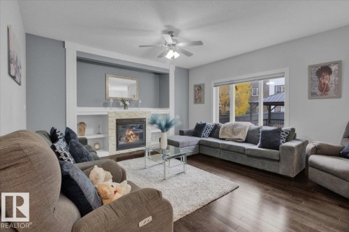711 Albany Place, Edmonton, AB - Indoor Photo Showing Living Room With Fireplace