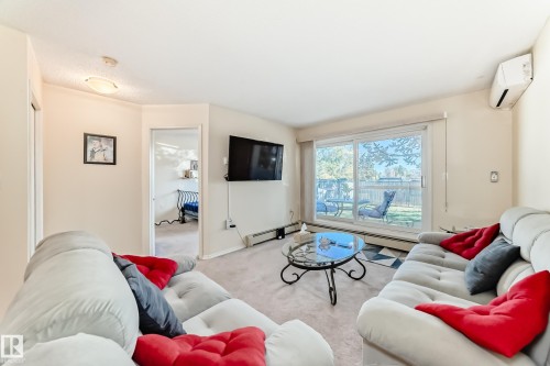 117 15503 106 Street, Edmonton, AB - Indoor Photo Showing Living Room