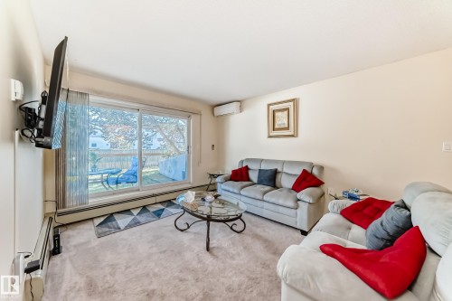 117 15503 106 Street, Edmonton, AB - Indoor Photo Showing Living Room