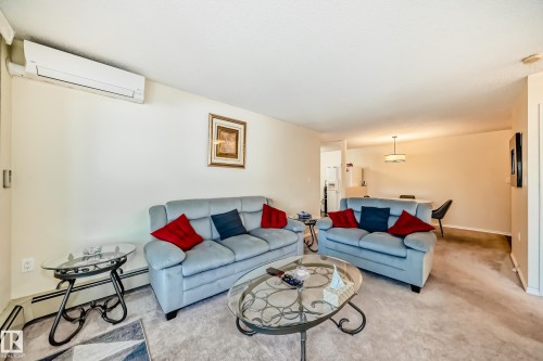 117 15503 106 Street, Edmonton, AB - Indoor Photo Showing Living Room