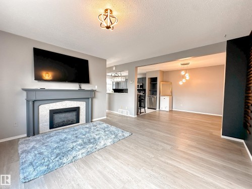 858 Erin Place, Edmonton, AB - Indoor Photo Showing Living Room With Fireplace
