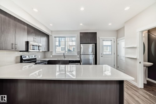 60 903 Crystallina Nera Way, Edmonton, AB - Indoor Photo Showing Kitchen With Upgraded Kitchen