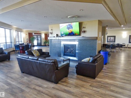 430 7825 71 Street, Edmonton, AB - Indoor Photo Showing Living Room With Fireplace