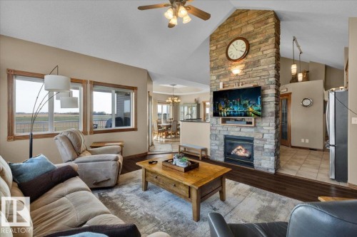 24703 Meridian Street, Edmonton, AB - Indoor Photo Showing Living Room With Fireplace