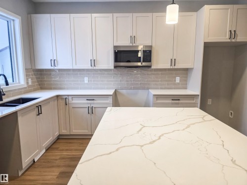 111 Brickyard Drive, Stony Plain, AB - Indoor Photo Showing Kitchen With Double Sink
