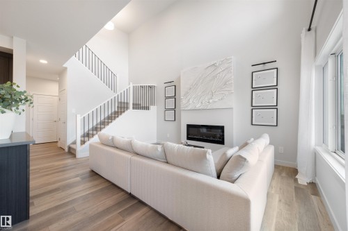 9332 183 Avenue, Edmonton, AB - Indoor Photo Showing Other Room With Fireplace