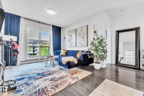 203 812 Welsh Drive, Edmonton, AB - Indoor Photo Showing Living Room