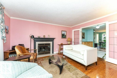 11531 78 Avenue, Edmonton, AB - Indoor Photo Showing Living Room With Fireplace