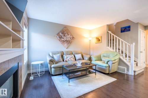 1692 Cunningham Way, Edmonton, AB - Indoor Photo Showing Living Room With Fireplace