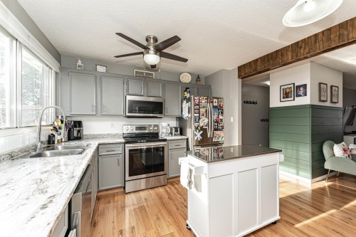10703 95 Avenue, Morinville, AB - Indoor Photo Showing Kitchen With Double Sink