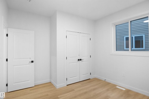 83 Meadowgrove Lane, Spruce Grove, AB - Indoor Photo Showing Other Room