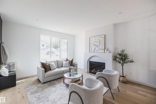 4216 121 Street, Edmonton, AB - Indoor Photo Showing Living Room With Fireplace