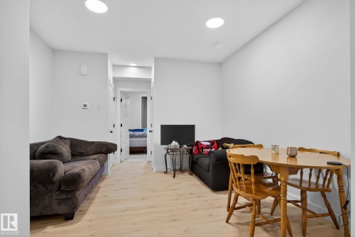 Living area featuring light wood-type flooring and recessed lighting - 382 Crystallina Nera Drive, Edmonton, AB - Indoor