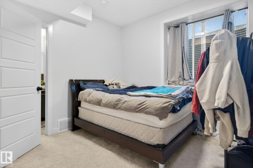 Bedroom featuring carpet flooring - 382 Crystallina Nera Drive, Edmonton, AB - Indoor Photo Showing Bedroom