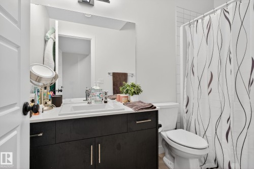 Full bathroom featuring vanity and a shower with shower curtain - 382 Crystallina Nera Drive, Edmonton, AB - Indoor Photo Showing Bathroom