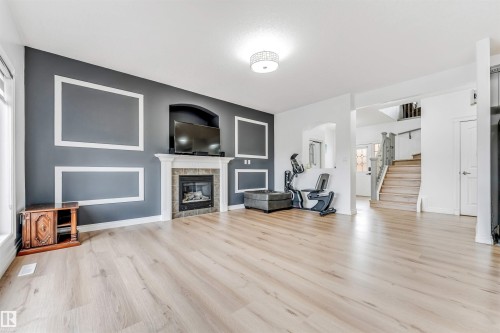 3319 18 Street, Edmonton, AB - Indoor Photo Showing Living Room With Fireplace