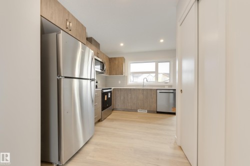 17233 4 Street, Edmonton, AB - Indoor Photo Showing Kitchen With Stainless Steel Kitchen