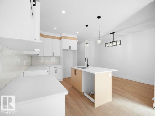 434 Crystal Creek Link, Leduc, AB - Indoor Photo Showing Kitchen With Upgraded Kitchen