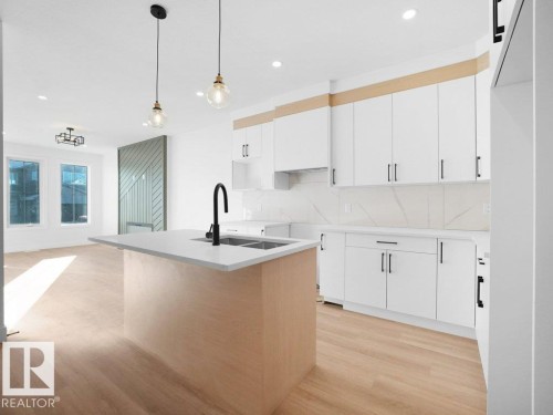 434 Crystal Creek Link, Leduc, AB - Indoor Photo Showing Kitchen With Double Sink With Upgraded Kitchen