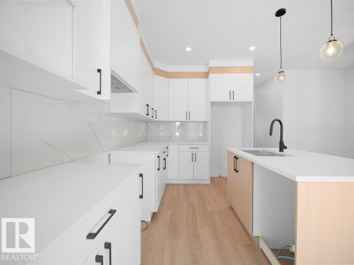 434 Crystal Creek Link, Leduc, AB - Indoor Photo Showing Kitchen With Upgraded Kitchen