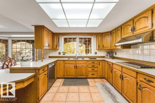 7550 Ellerslie Road, Edmonton, AB - Indoor Photo Showing Kitchen With Double Sink