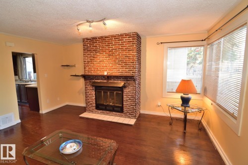 11343 69 Street, Edmonton, AB - Indoor Photo Showing Living Room With Fireplace