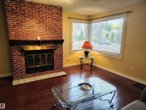 11343 69 Street, Edmonton, AB - Indoor Photo Showing Living Room With Fireplace