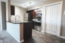 313 3211 James Mowatt Trail, Edmonton, AB  - Indoor Photo Showing Kitchen 