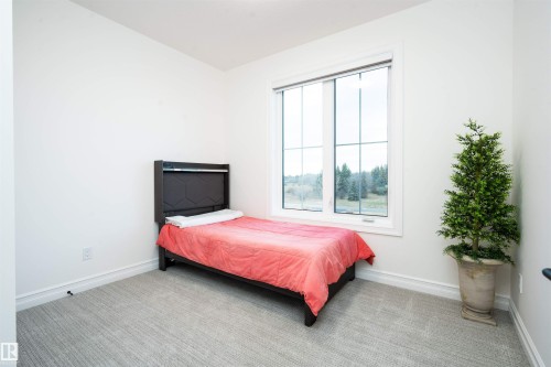 320 50452 Rge Rd 245, Rural Leduc County, AB - Indoor Photo Showing Bedroom
