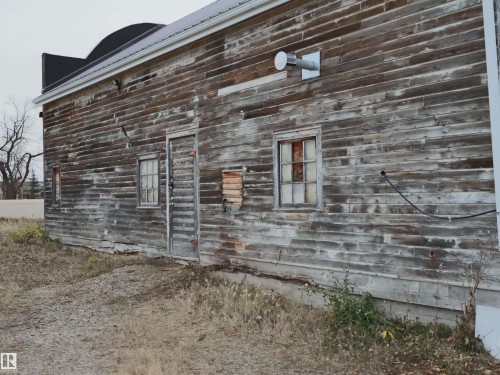 View of home's exterior featuring a metal roof - 4032A Twp Rd 604, Rural Barrhead County, AB - Outdoor
