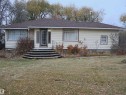 View of front of house featuring a front yard and roof with shingles - 4032A Twp Rd 604, Rural Barrhead County, AB  - Outdoor 