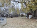 View of yard with view of wooded area and a storage unit - 4032A Twp Rd 604, Rural Barrhead County, AB  - Outdoor 